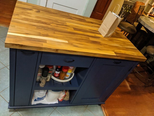 Blue Kitchen Island with seating. Spice rack kitchen Island