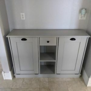 gray cabinet with shelf in the middle