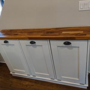 white cabinet with wood top