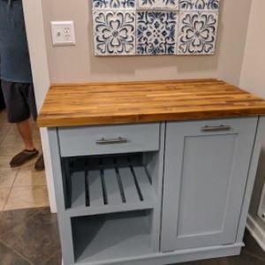 Kitchen Island blueish green with wood top