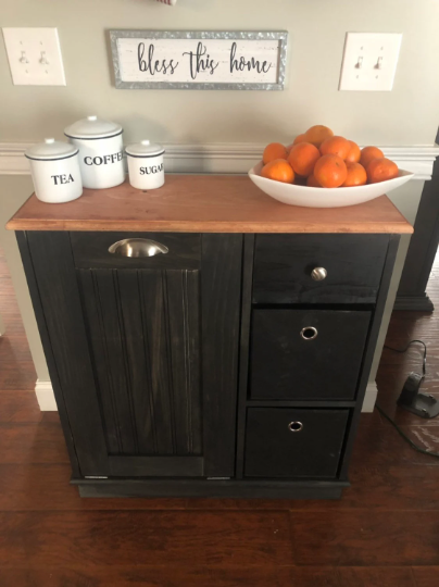 wooden trash bin with dark paint and drawers