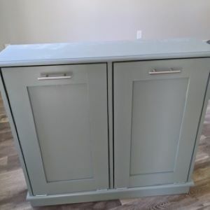 grayish blue trash bin cabinet