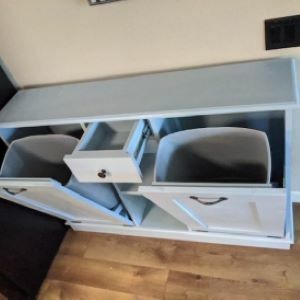 gray cabinet with drawers open