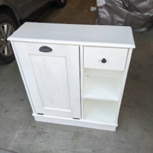 white trash bin cabinet with shelves