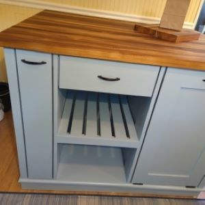 blue-gray kitchen island with wood top