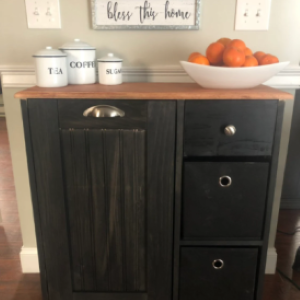 black cabinet with containers and oranges