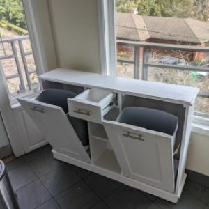 white cabinet with drawers open