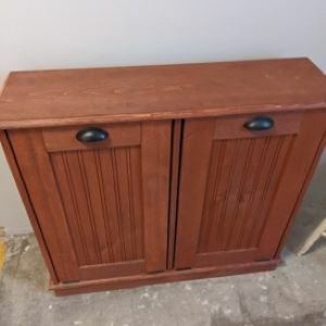 brown trash bin cabinet