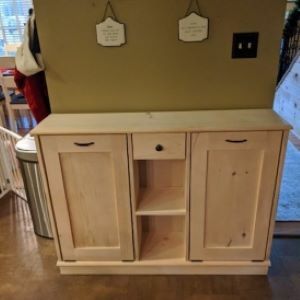 tan cabinet with shelf in middle